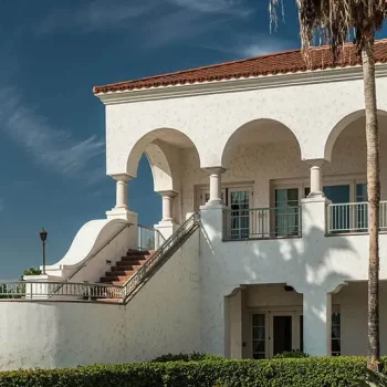 white-building-with-stairs-and-a-palm-tree-2024-06-18-01-08-29-mob